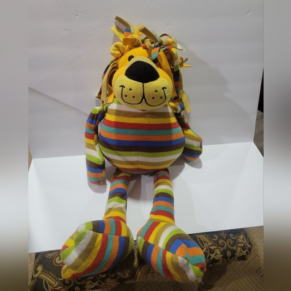 Melissa and Doug colorful Elvis the lion stuffie